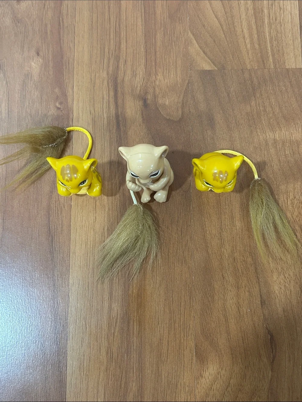 Mattel Yellow & Beige Plush-Tail Animal Pull Toys